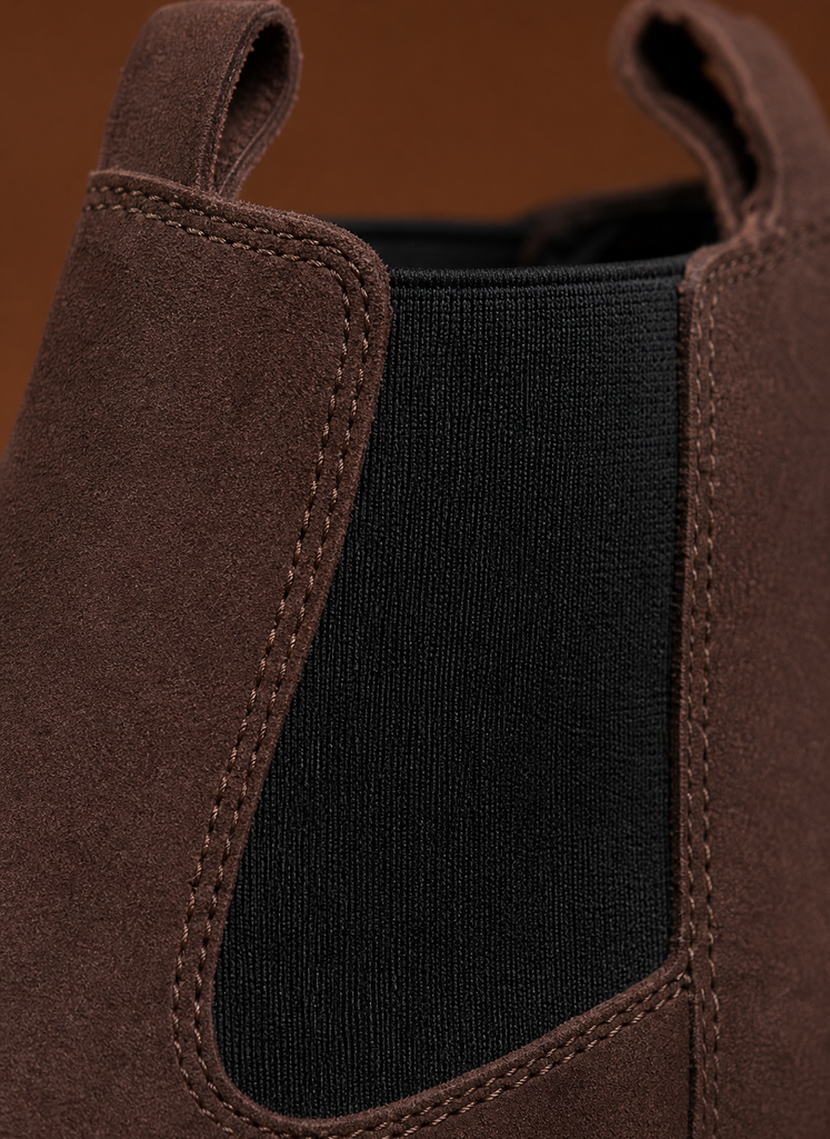 Close-up of chunky lug sole and stitching detail on women's Chelsea boot