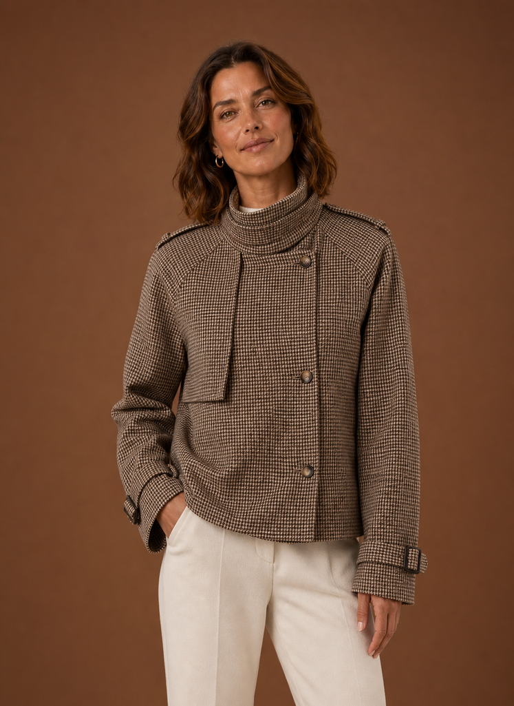Front view of women's funnel neck cropped check jacket on a mannequin