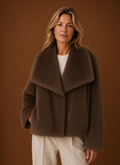 Front view of women's faux fur coat showing open-front silhouette