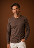 Front view of men's long-sleeve Henley shirt with chest pocket and button placket