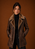 Front view of brown women's aviator jacket with zip-front closure and plush collar