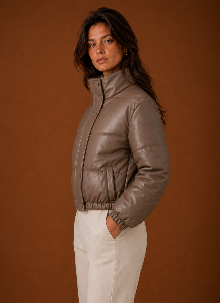 Side view of the women's bomber jacket showing sleeve profile and streamlined shape