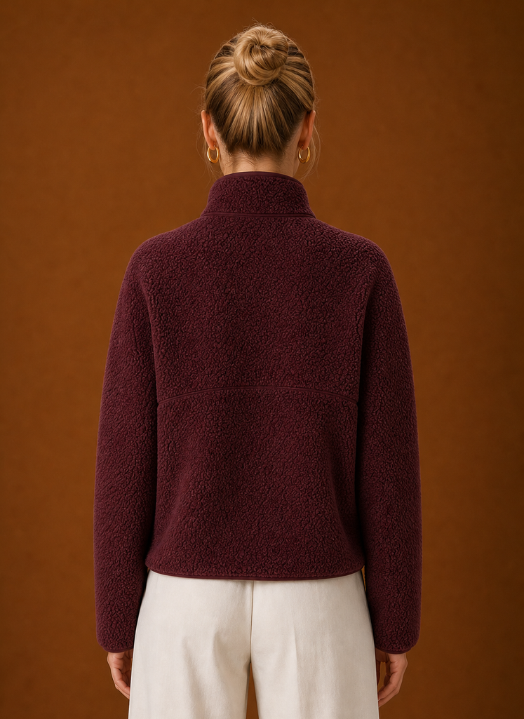 Back view of the pullover showing fit and finished hem