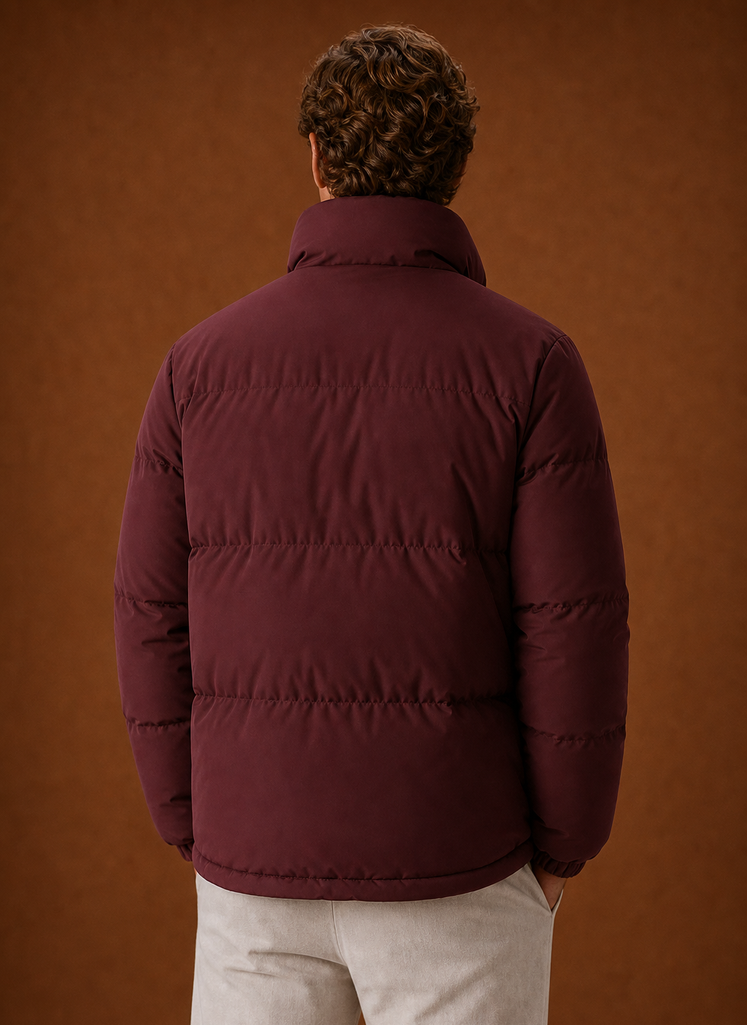Rear view of the puffer jacket showing the back shape and quilting pattern