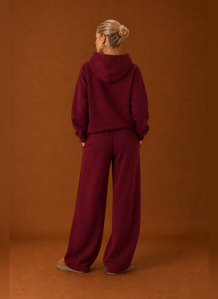 Back view of the matching sweatsuit set showing a clean silhouette