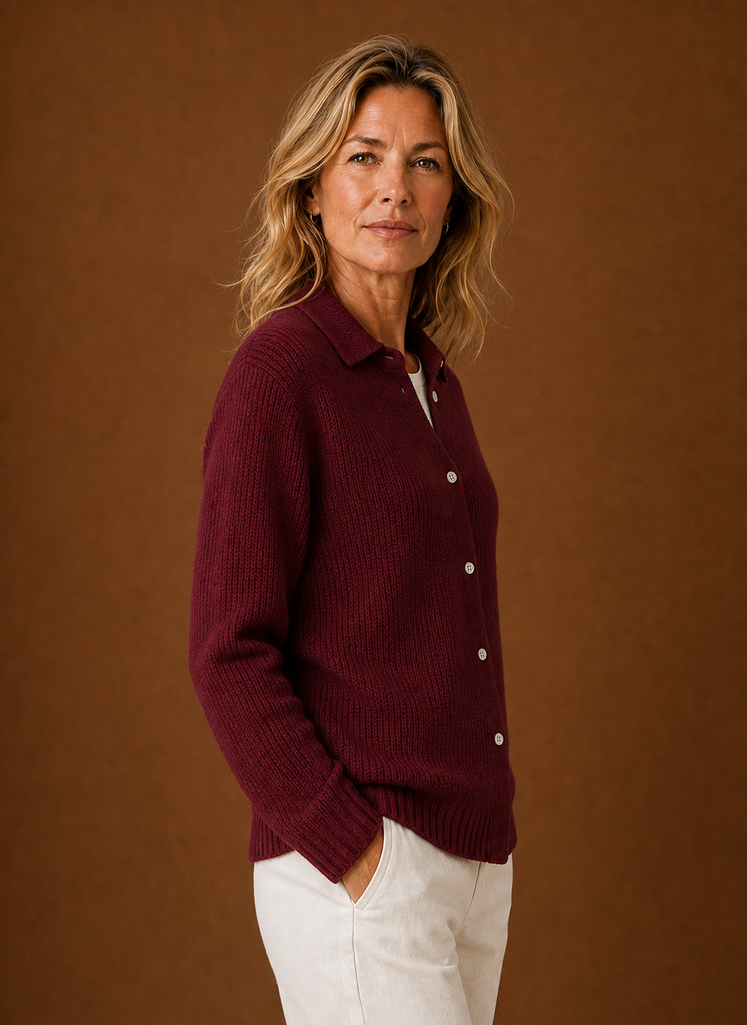 Side view of women's knit cardigan showing profile and sleeve shape