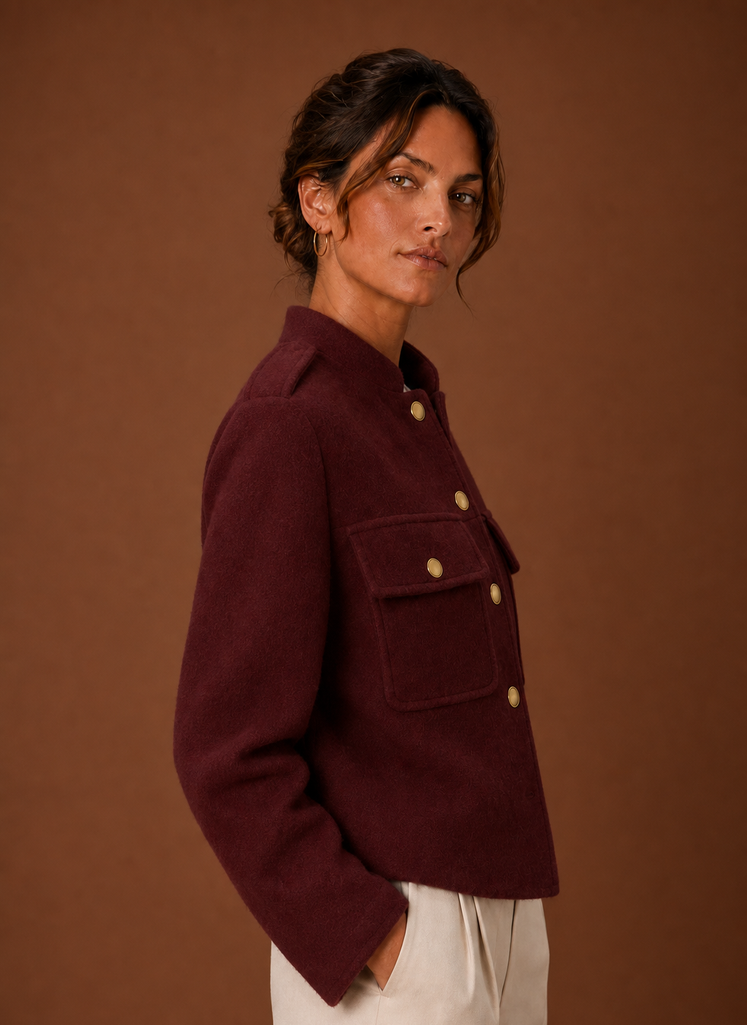 Side view of the cropped jacket showing silhouette and sleeve length