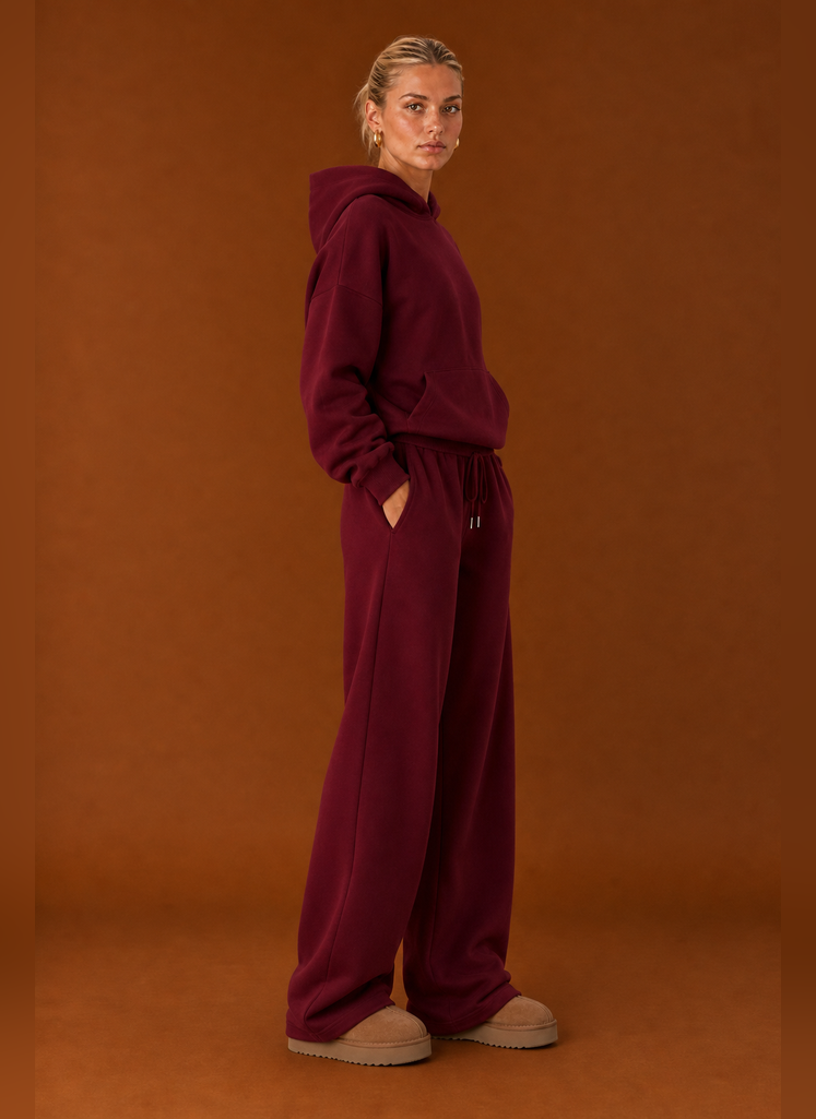 Side profile of the sweatsuit highlighting the fit of the top and pants