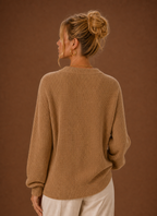 Back view of women's knit cardigan showing clean hemline and fitted shoulders