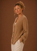 Side view of women's V-neck knit cardigan showing sleeve drape and silhouette