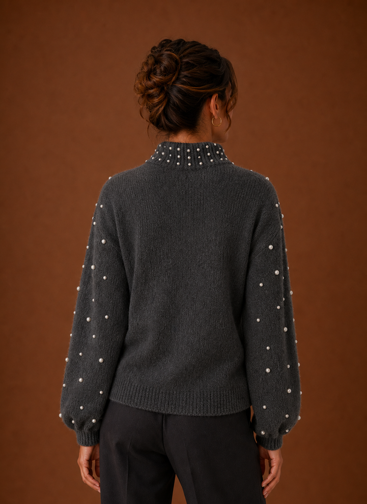 Back view of women's knit pullover sweater