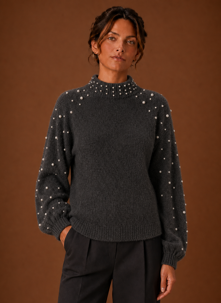 Front view of women's pearl embellished knit pullover sweater