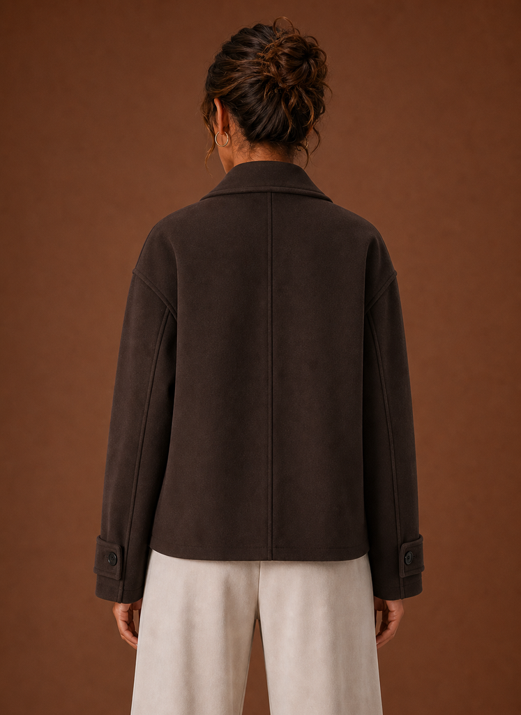 Back view of Areleon women's double-breasted cropped coat showing cropped length and clean back silhouette