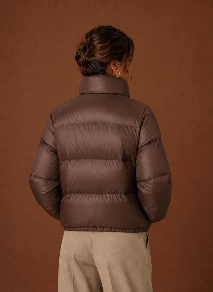 Back view of Areleon women's puffer jacket in chocolate brown