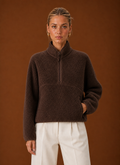 Front view of the women's quarter-zip teddy pullover on a mannequin showing the neckline and relaxed fit