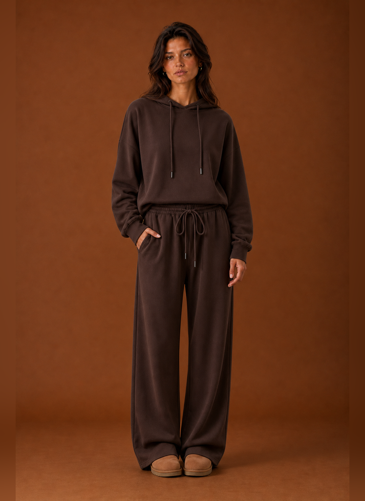 Front view of a women's two-piece sweatsuit set showing sweatshirt and matching pants on a mannequin