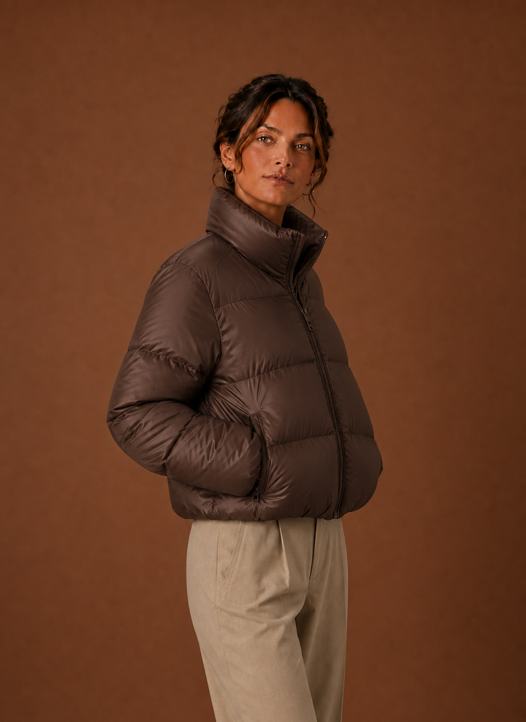Side profile of Areleon women's puffer jacket in chocolate brown showing the silhouette
