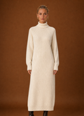 Front view of women's turtleneck ribbed knit maxi sweater dress on a mannequin