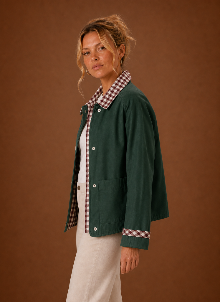 Side view of the barn jacket highlighting the relaxed fit and cropped silhouette
