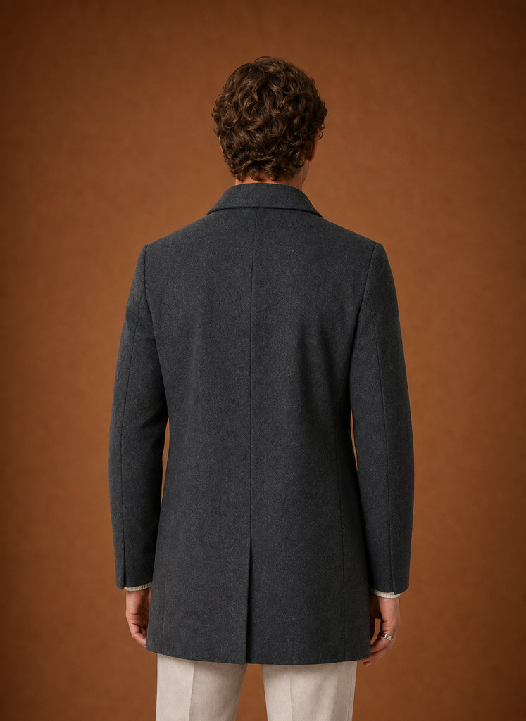 Back view of men's long overcoat showing clean seam lines
