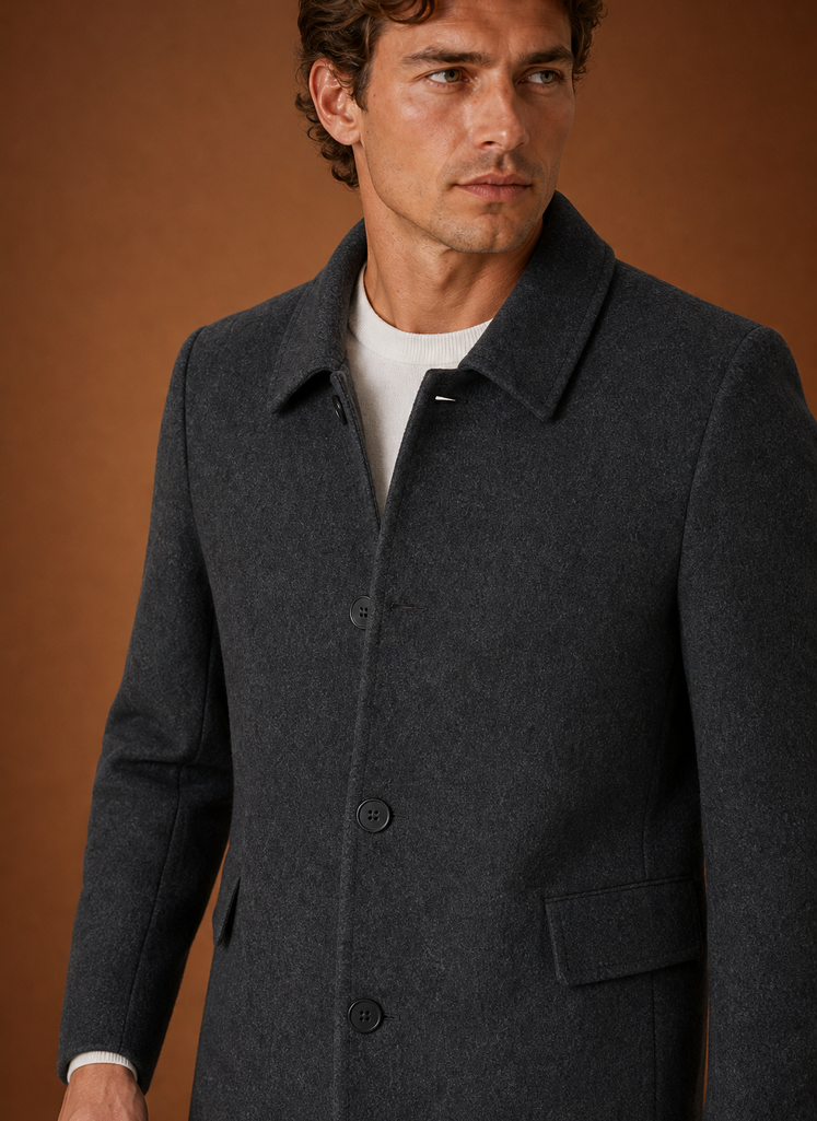 Close-up of overcoat fabric and finished lapel and cuff details
