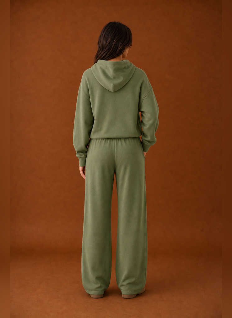 Back view of the two-piece women's sweatsuit showing sweatshirt and matching pant details