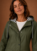 Close-up of hood and collar area of the women's trench coat with visible stitching detail