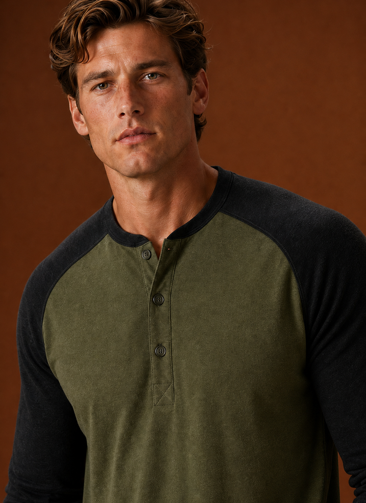 Close-up of the button-placket and neckline detailing on the Henley shirt