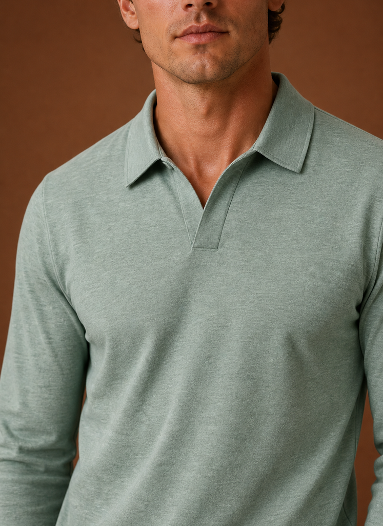 Close-up of button placket and collar detail on men's polo shirt in beige