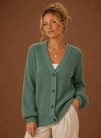 Front view of women's V-neck knit cardigan with button-front closure on a mannequin