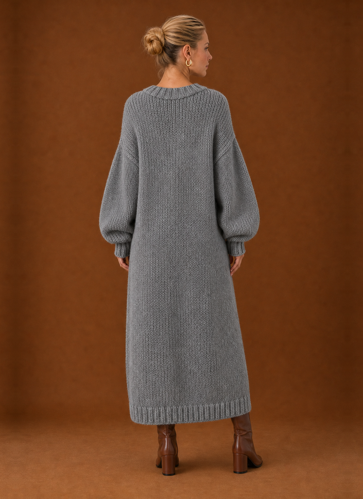Back view of the knit maxi dress highlighting the full-length silhouette