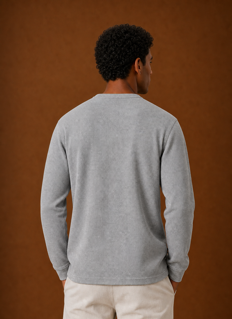 Back view of men's waffle knit Henley shirt showing knit texture and clean hem