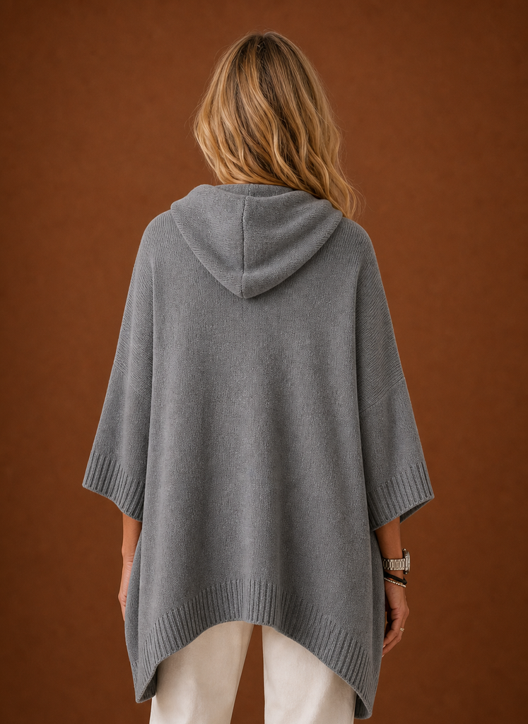 Back view showing hood and straight hem of the pullover