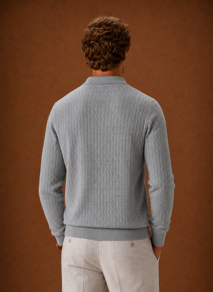Back view of men's oversized ribbed pullover with clean, unbroken knit back