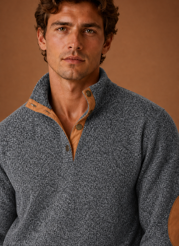 Close-up detail of the mock neck and knit texture at the neckline
