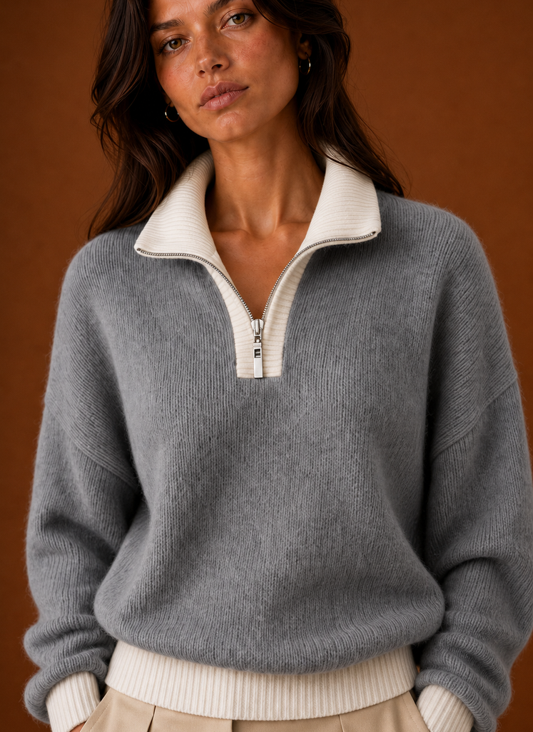 Close-up of the quarter-zip neckline and zipper detail