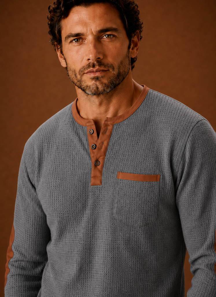 Close-up of waffle knit texture and Henley button placket on the shirt