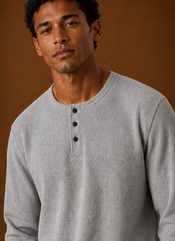 Close-up of waffle knit texture and Henley button placket