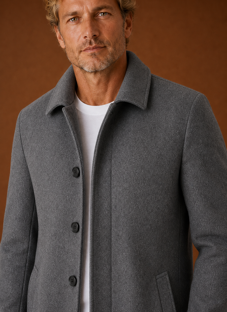 Close-up detail of the overcoat's texture and stitching at the front panel