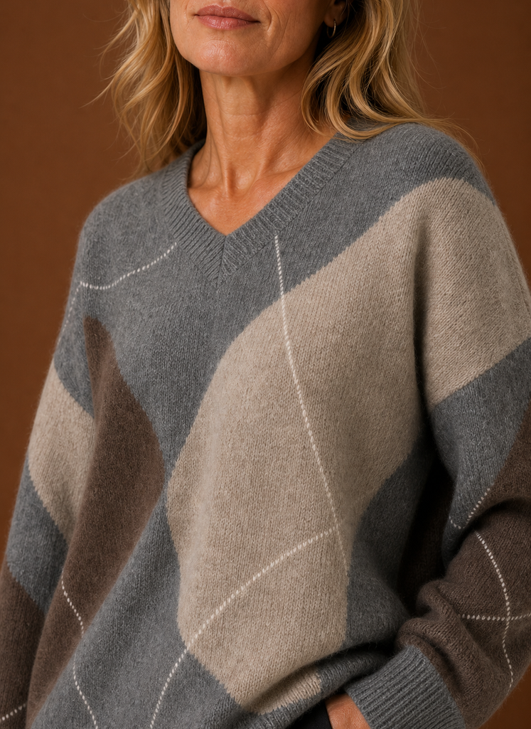 Close-up of argyle pattern and knit texture on the women's pullover
