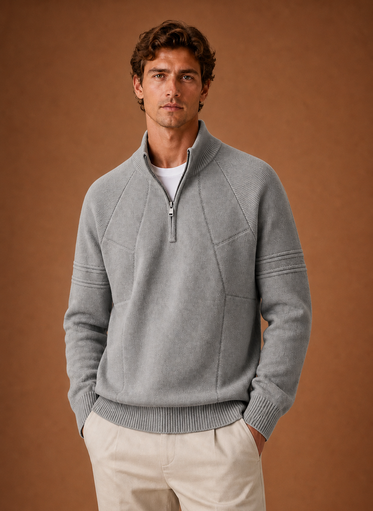 Front view of men's half-zip knit sweater on a neutral background