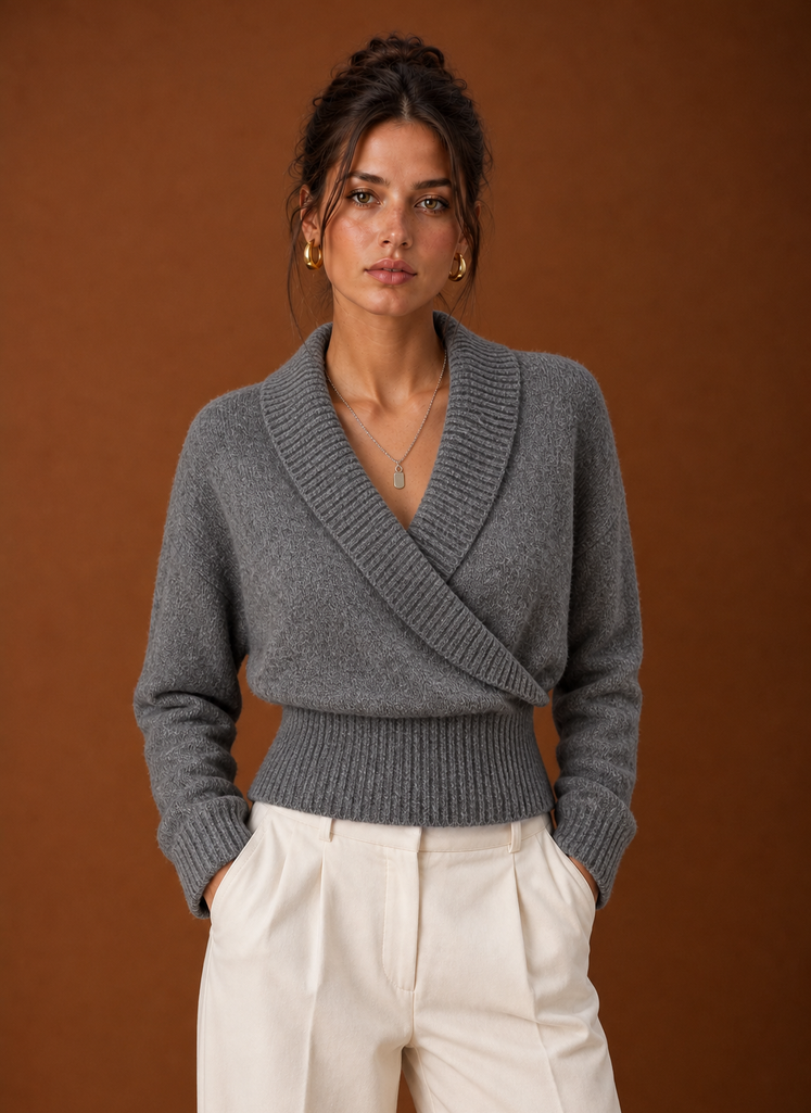 Front view of women's wrap sweater showing shawl collar, V-neck and ribbed knit drape