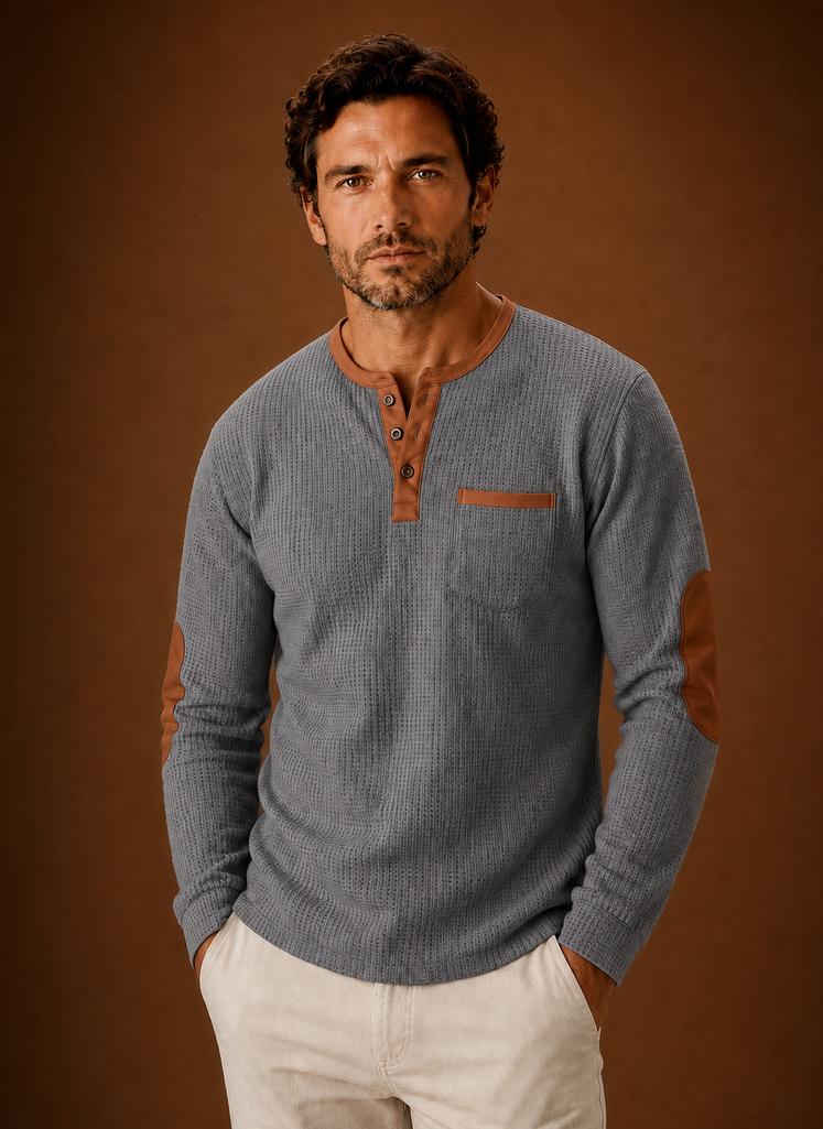 Front view of men's waffle-knit Henley long-sleeve shirt on a plain background