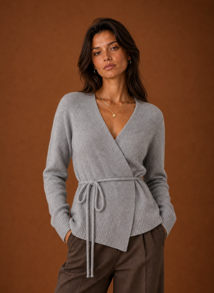 Front view of women's wrap cardigan with tie waist belt on a mannequin
