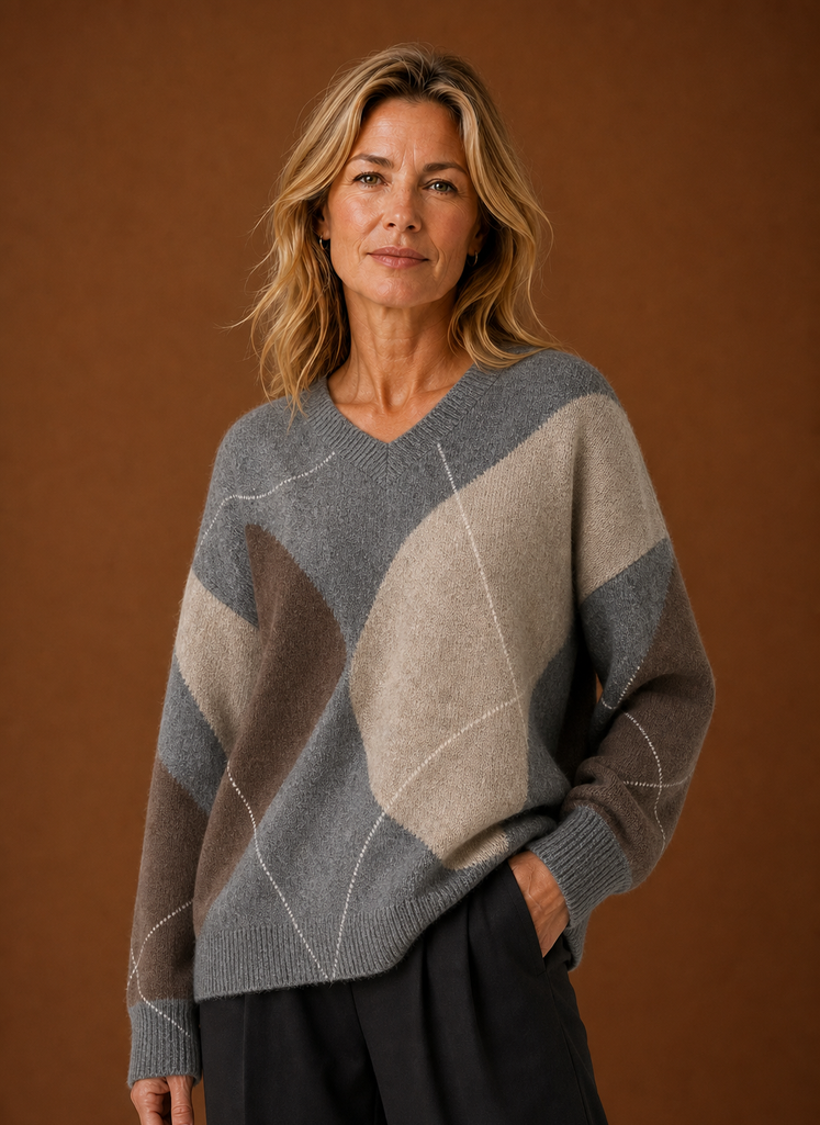 Front view of women's argyle knit pullover on mannequin showing full pattern and silhouette