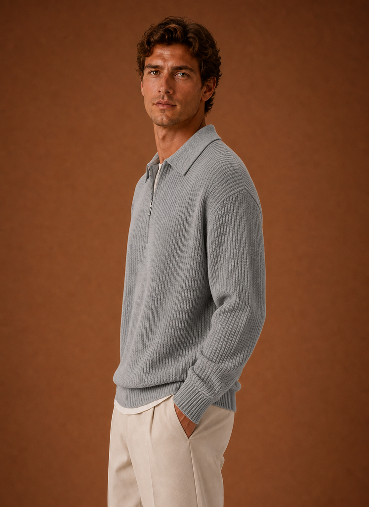 Side profile of the oversized quarter-zip knit sweater showing the relaxed silhouette