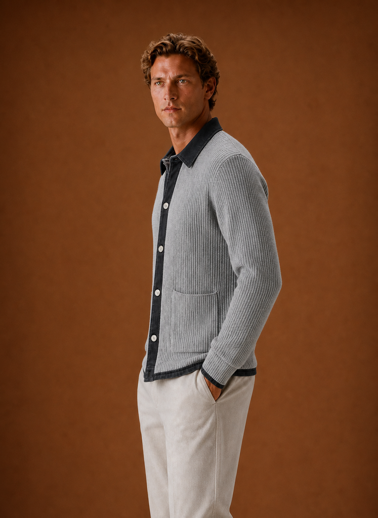 Side profile of men's black knit cardigan showing slim fit and long sleeve shape