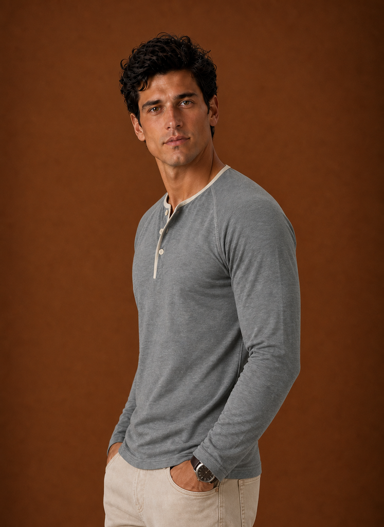 Side view of a men's Henley shirt displaying fit and sleeve line
