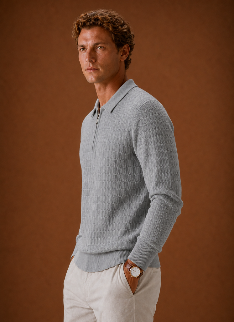 Side view of men's half-zip pullover displaying relaxed silhouette and sleeve profile