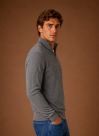 Side view of men's shirt jacket highlighting sleeve profile and relaxed fit